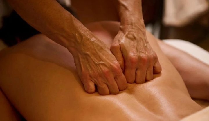 A person performing Deep Tissue Massage Therapy - Massage in Pokhara