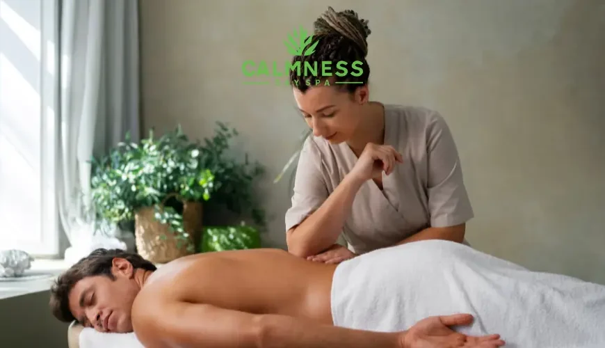 A man getting a massage in a spa by a massage therapist